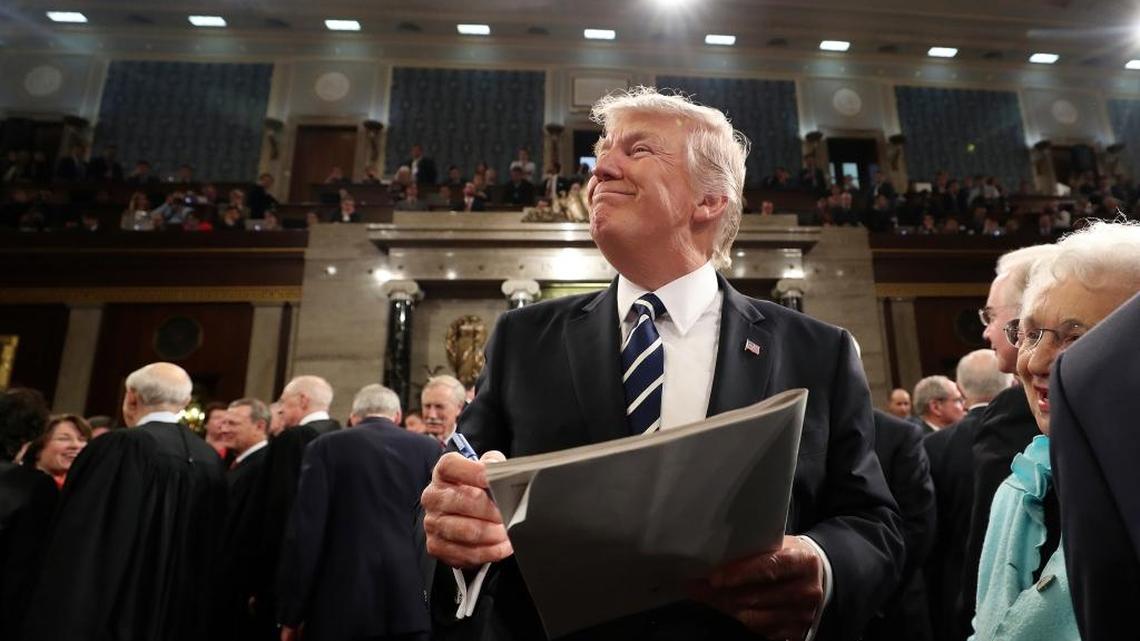President Donald Trump leaves after his speech to a joint session of Congress on Tuesday.