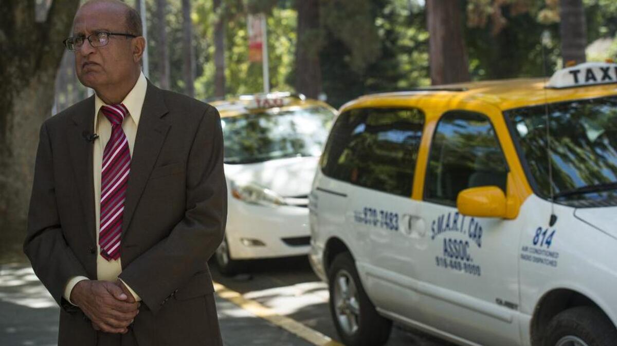 
Kazman Zaidi, President of the Sacramento Taxi cab union, AFL-CIO speaks about the unfairness of not allowing taxi cab companies the same rights as Uber on Wed., Sept. 2, 2015 in Sacramento, Calif.
