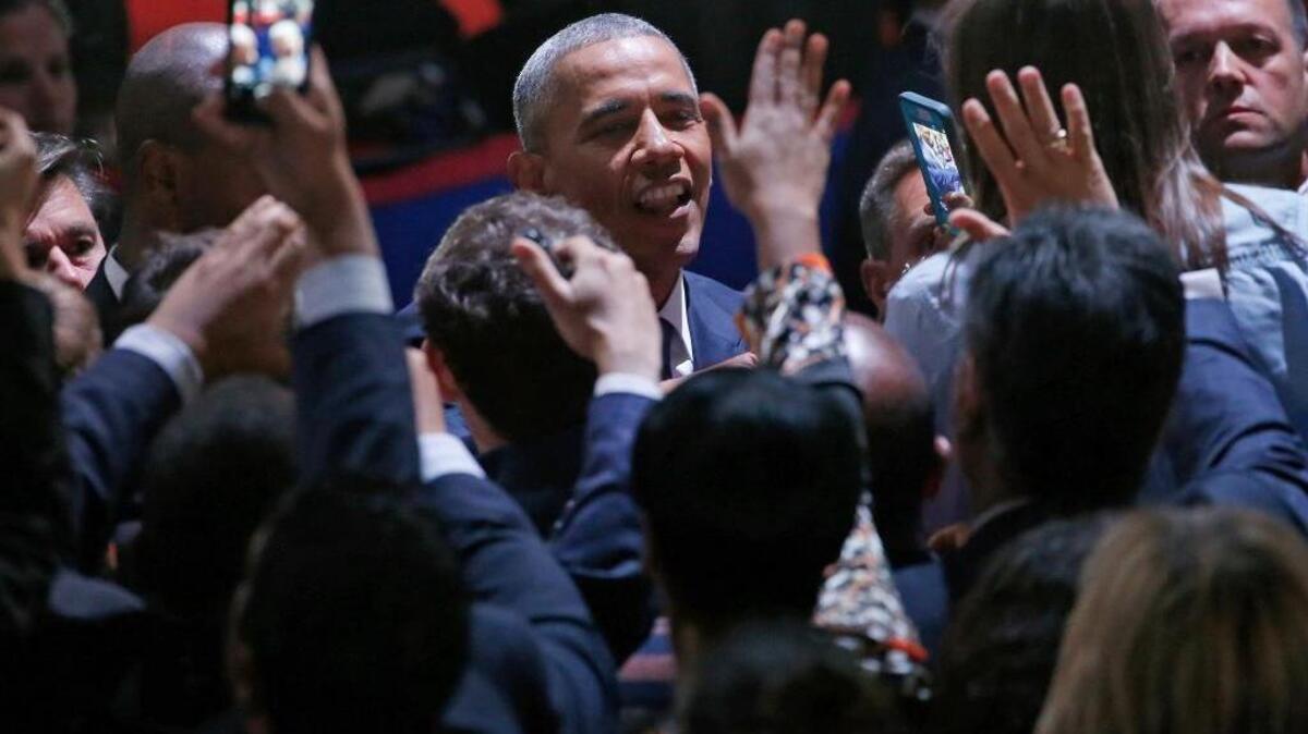 President Barack Obama greets supporters after his presidential farewell address in Chicago on Jan. 10.