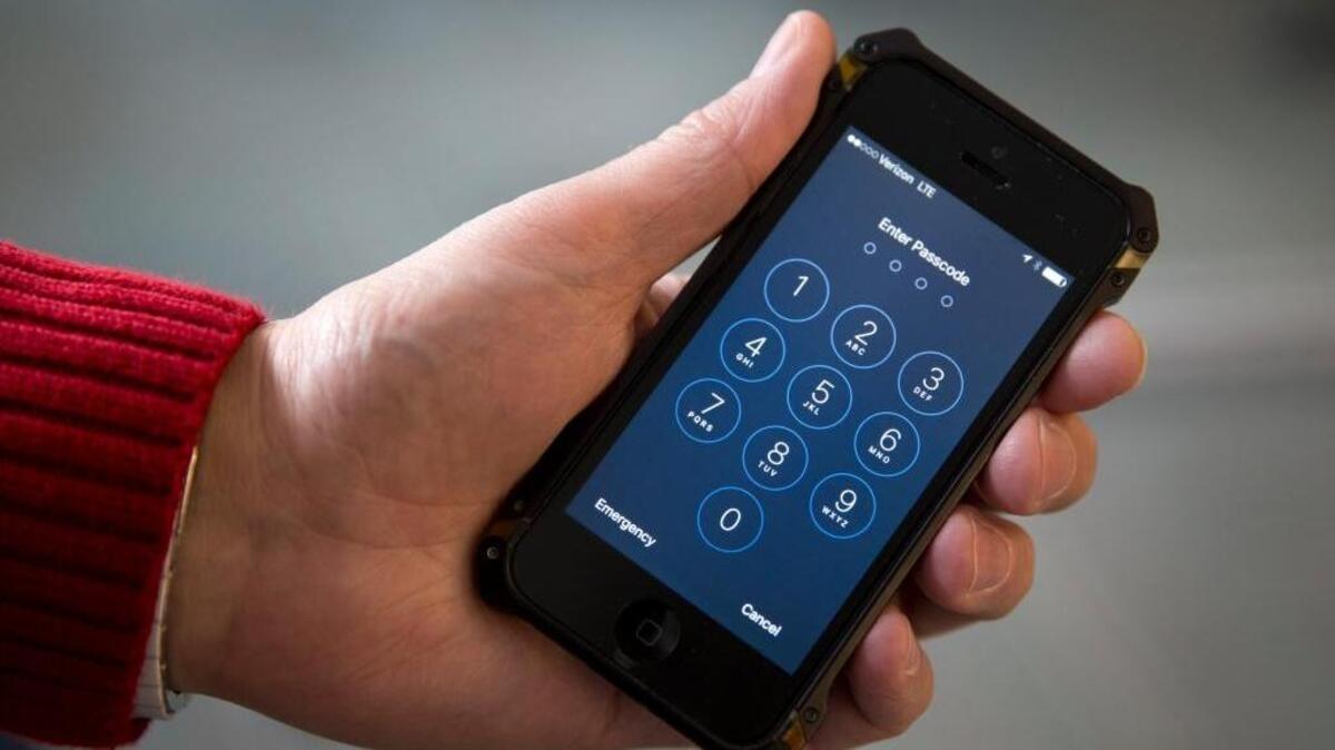 The San Bernardino County-owned iPhone at the center of an unfolding high-profile legal battle between Apple Inc. and the U.S. government lacked a device management feature bought by the county that, if installed, would have allowed investigators easy and immediate access.