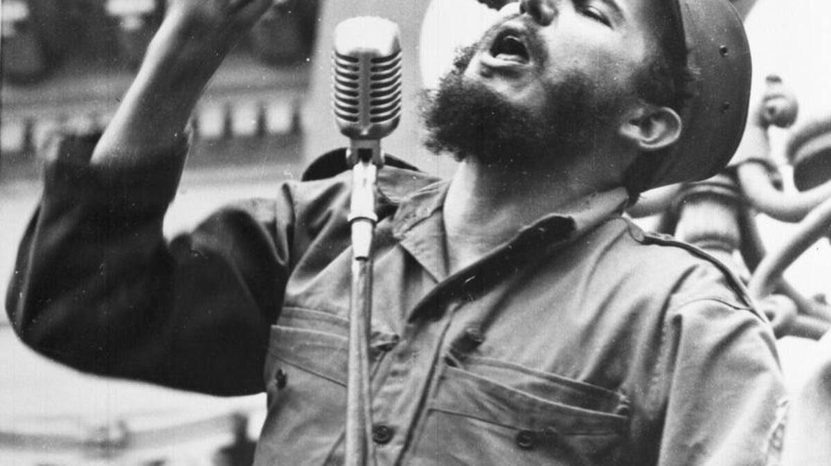 Cuba’s leader Fidel Castro speaks to a crowd during his triumphant march to Havana after the fall of the Batista regime Feb. 6, 1959.