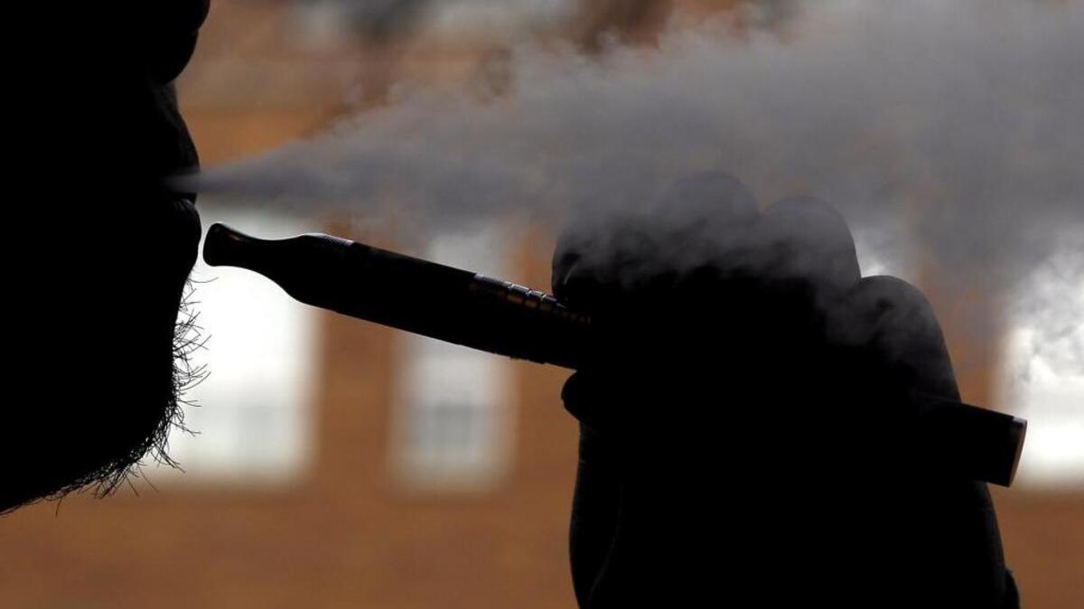 Gov. Jerry Brown signed several bills that will place restrictions on use of e-cigarettes and make California the second state to raise its smoking age to 21.