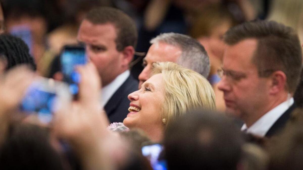 Hillary Clinton greets supporters after she made a campaign stop in Sacramento City College on Sunday.