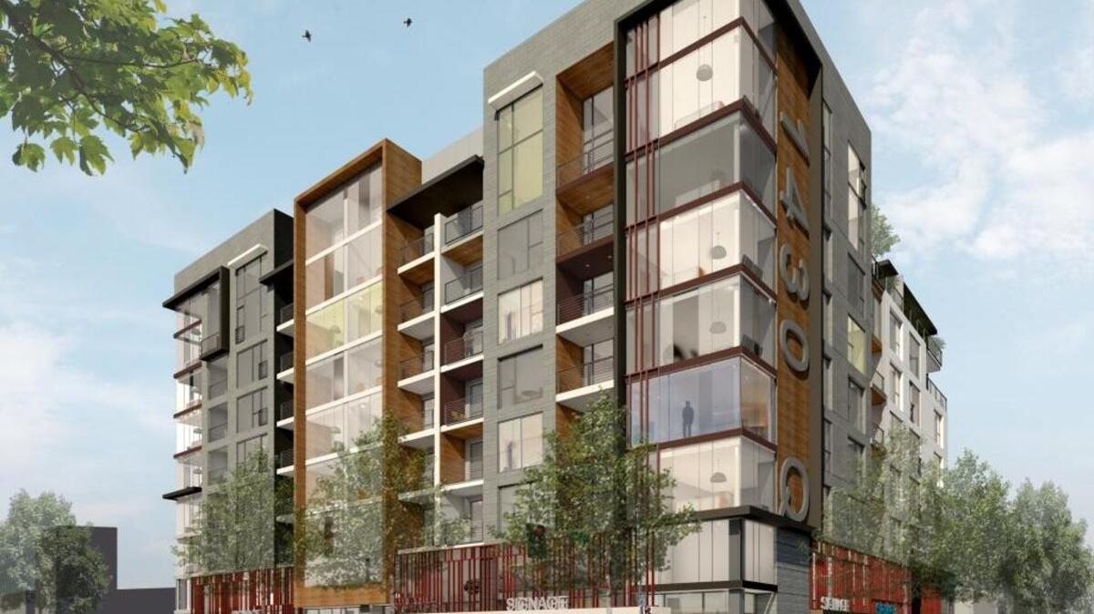 An artist’s rendering shows the eight-story apartment complex planned for 15th and Q streets in downtown Sacramento.