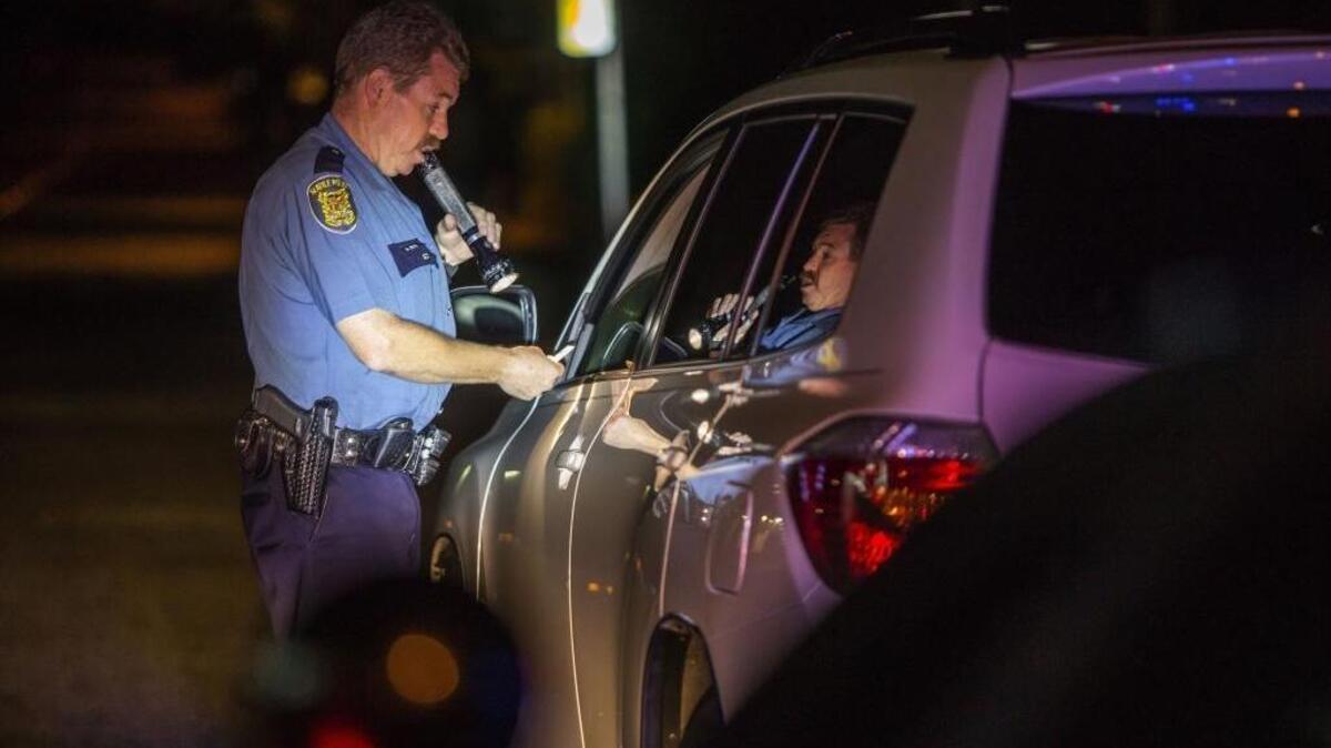 Seattle police Officer Mike Lewis is part of a group of more than 200 law-enforcement personnel across the state who have been specially trained to spot and evaluate motorists impaired by drugs and alcohol.