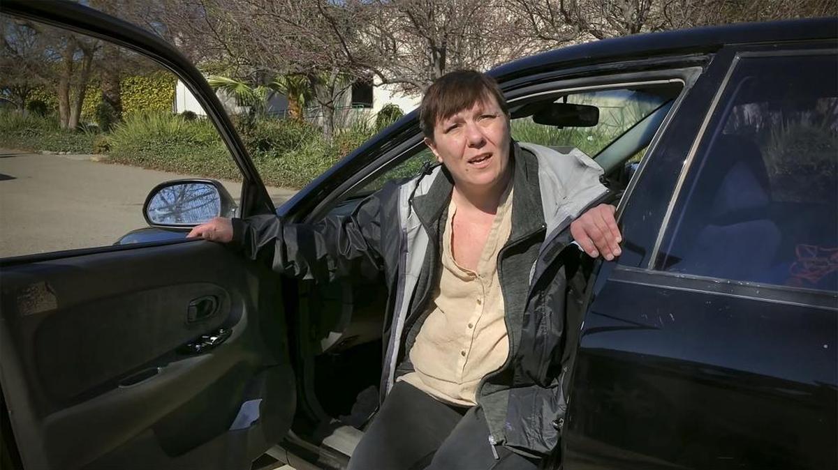 Lara Woods, shown here in her car in Sacramento on Tuesday, February 13, 2018, said she was “dumped” to the streets after undergoing double mastectomy surgery at UC Davis Cancer Center. Lara Woods was homeless when she underwent a double mastectomy at UC Davis Cancer Center. The hospital put her in a cab just days after her surgery, she said, and sent her to Salvation Army, which had no bed for her. She was forced to live in her car. Homeless services agencies regularly see fragile people discharged by health care agencies to the streets.