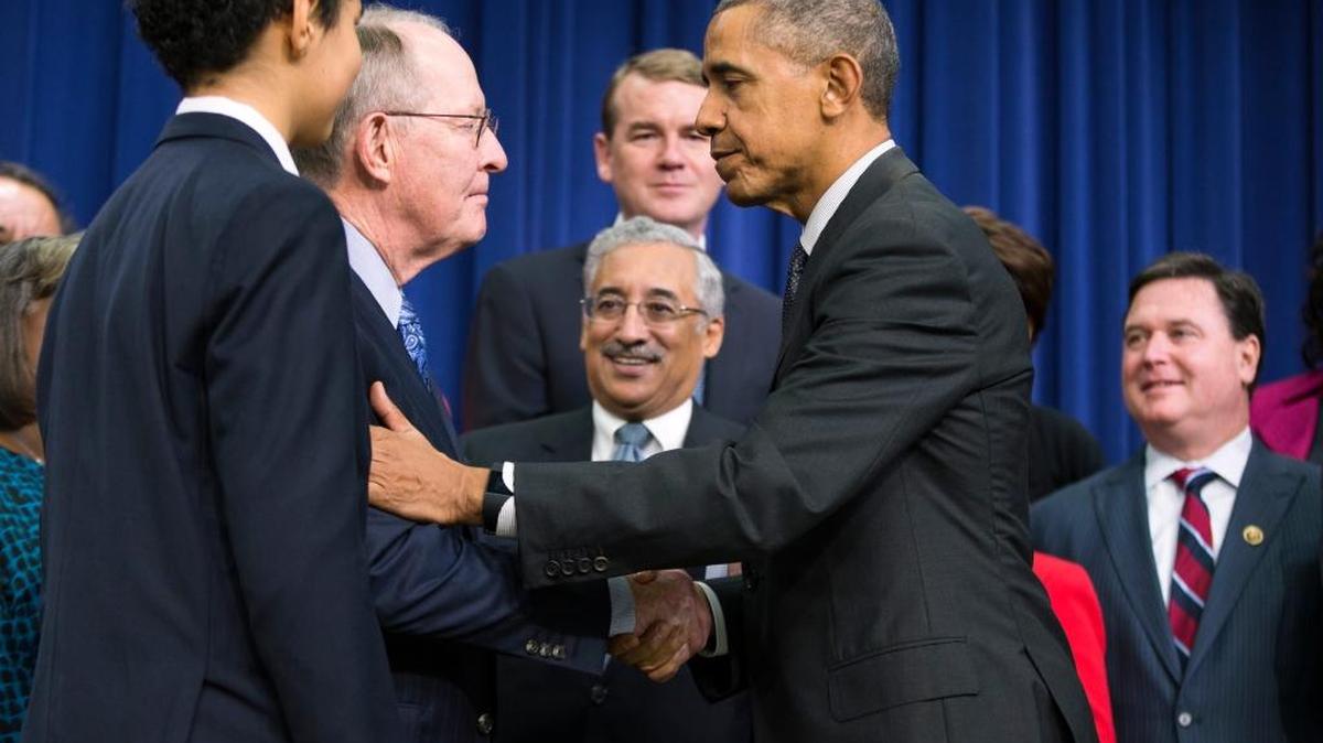 President Barack Obama shakes hands with Sen. Lamar Alexander, R-Tenn., a co-sponsor of the Every Student Succeeds Act, at the bill’s signing on Dec. 10.
