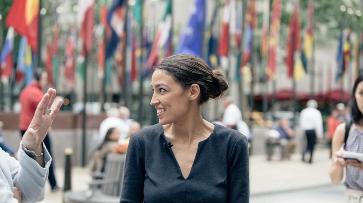 Alexandria Ocasio-Cortez, a political newcomer, talks to reporters in New York on June 27. Ocasio-Cortez unseated Democratic Rep. Joseph Crowley, a 20-year incumbent.