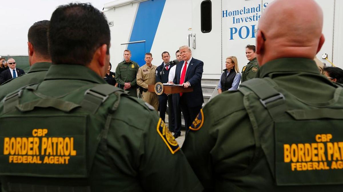 President Donald Trump makes a statement after taking a tour of the border wall prototypes near the Otay Mesa Port of Entry in San Diego County on March 13.