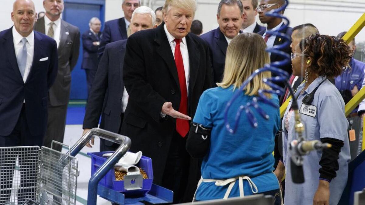 President-elect Donald Trump greet workers during a visit Thursday to the Carrier factory in Indianapolis.