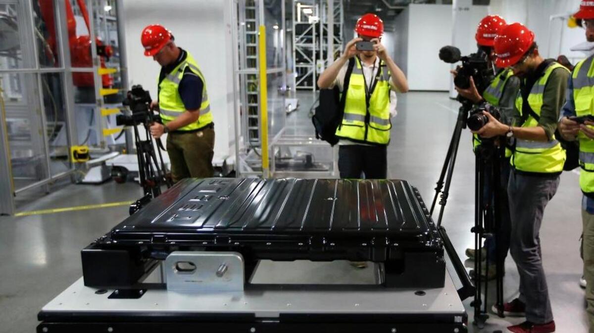A Tesla battery pack is displayed during a media tour of the new Tesla Motors Inc., Gigafactory last year in Sparks, Nev.