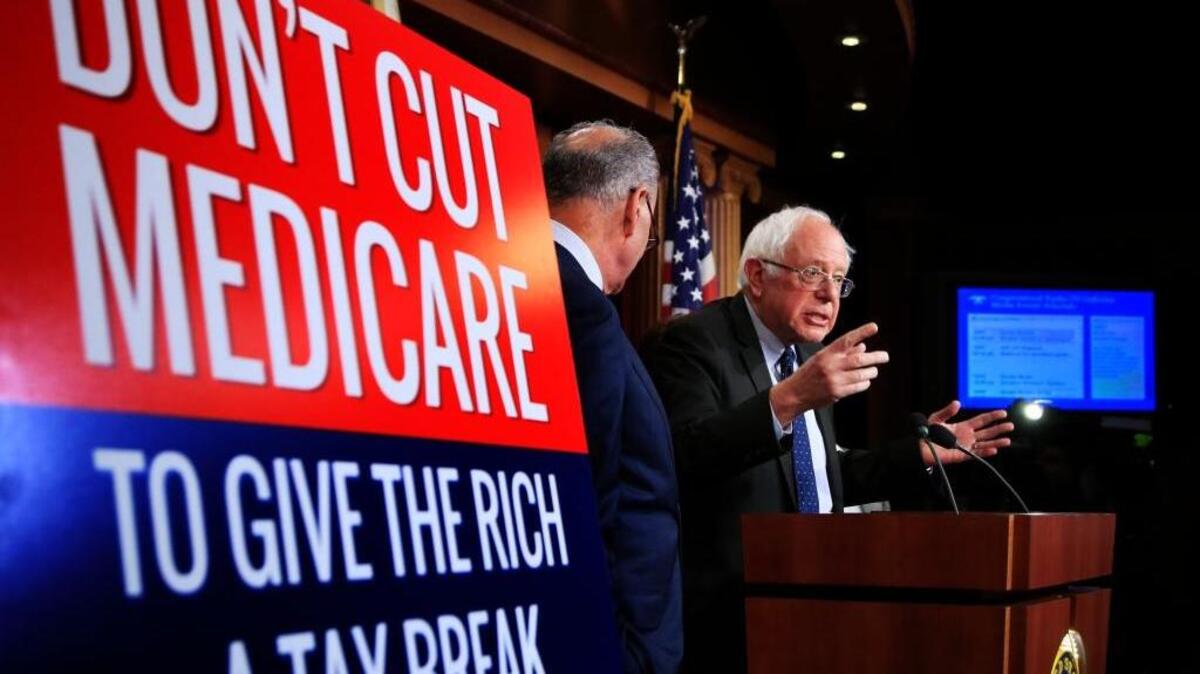 Sen. Bernie Sanders of Vermont speaks at a news conference on Capitol Hill on Oct. 4, urging Republicans to abandon cuts to Medicare and Medicaid.