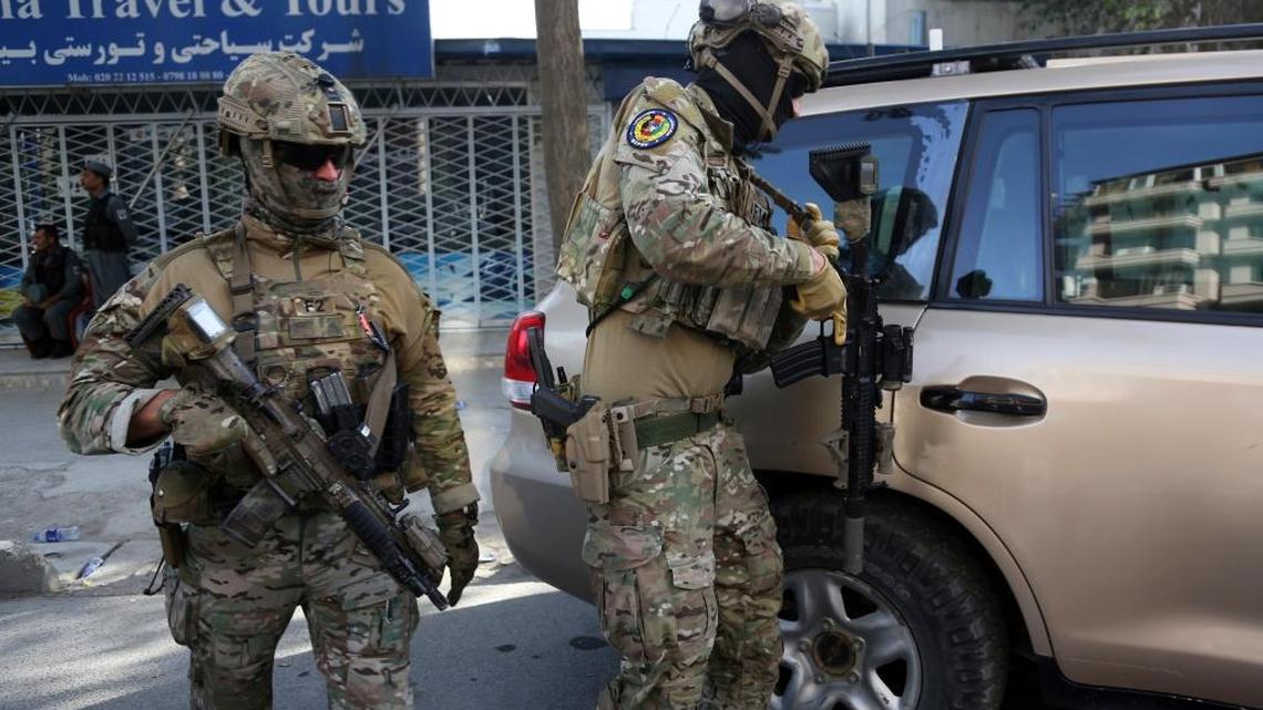 U.S. troops respond to a July 31 suicide attack followed by a clash between Afghan forces and Islamic State fighters at the Iraqi embassy in Kabul, Afghanistan.