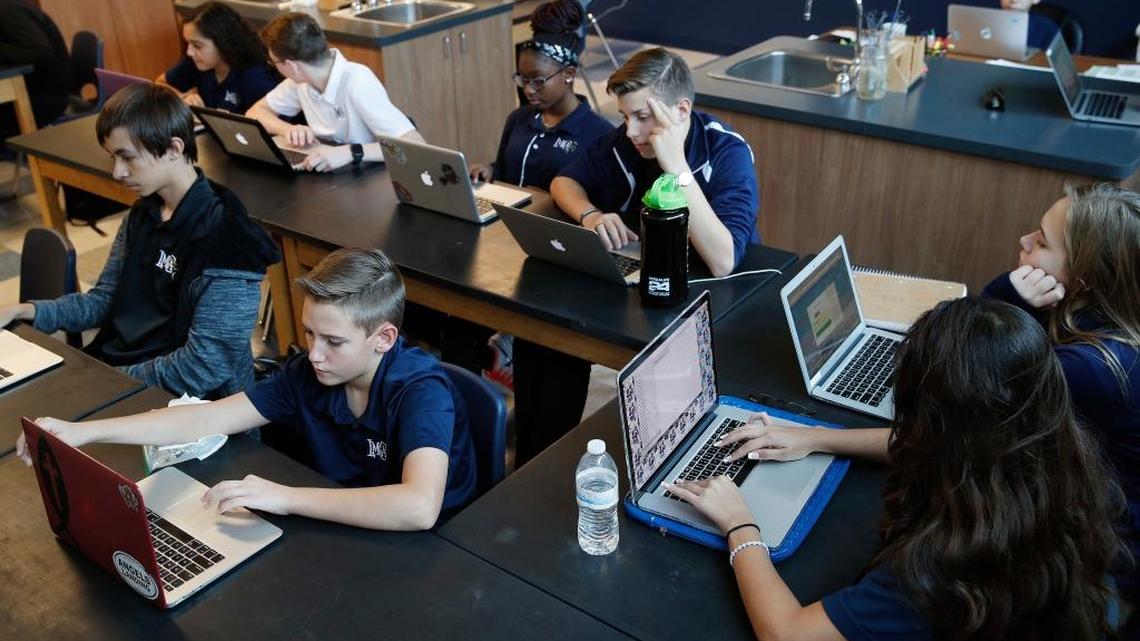 Students work on computers in November in a freshman biology class at Lake Mead Christian Academy in Henderson, Nev. Standardized tests are mandatory for Nevada private schools participating in the state’s school choice program.