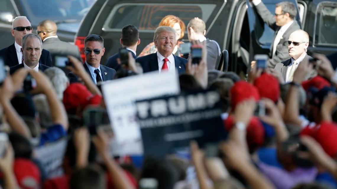Donald Trump greets supporters before speaking at a rally Friday in Omaha, Neb.