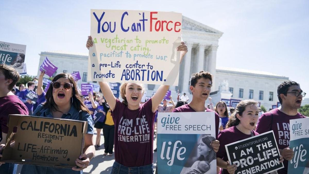 Abortion opponents demonstrate outside the U.S. Supreme Court building in Washington on June 26. A California law requiring crisis pregnancy centers to supply women with information about abortion likely violates the First Amendment, the Supreme Court ruled.
