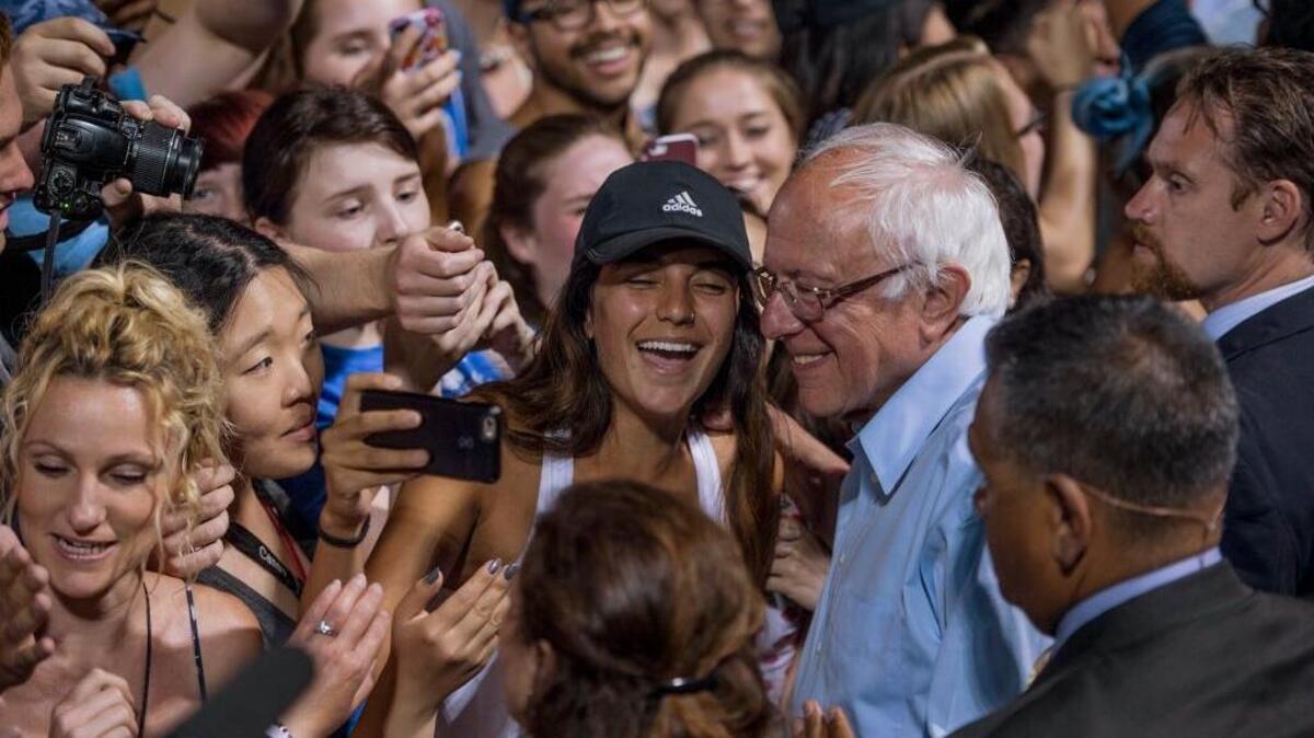 Bernie Sanders meets supporters after speaking at a rally at Hutchinson Intramural Field at UC Davis on Wednesday.