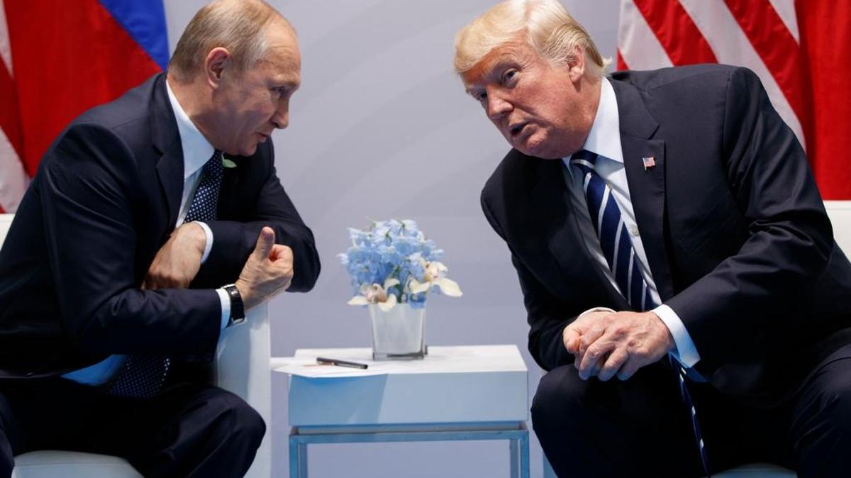 President Donald Trump speaks to Russian President Vladimir Putin at the G20 Summit on Friday in Hamburg, Germany.