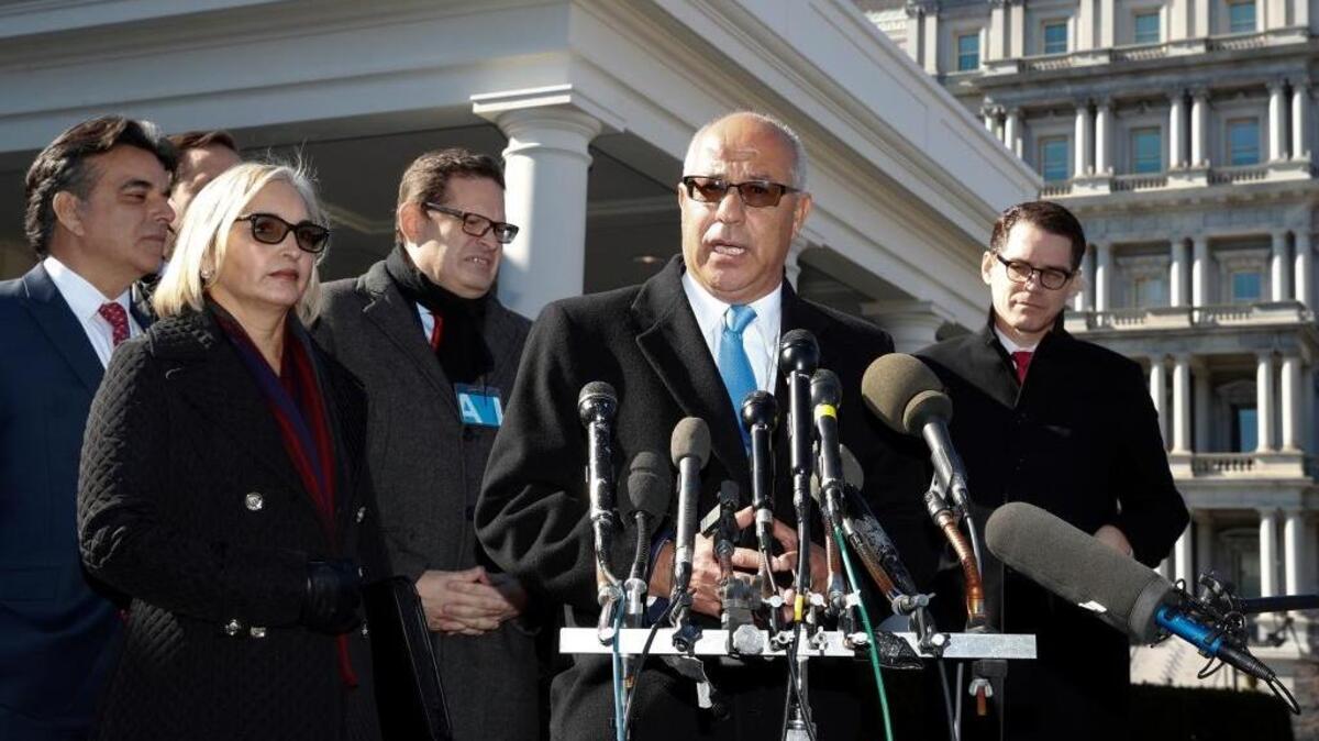 Mario Rodriguez of the Hispanic 100 and other conservative Hispanice leaders speak outside the West Wing of the White House on Monday to urge Democrats to negotiate with the Trump administration on immigration.