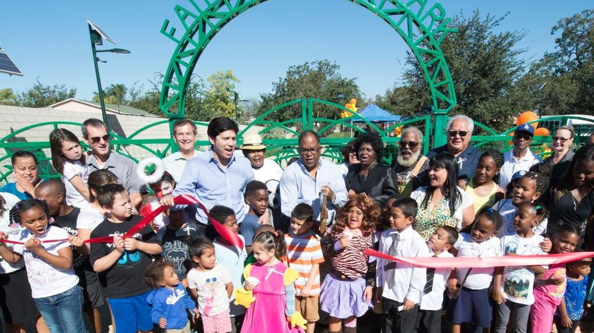 Elected officials and community members celebrate the grand opening of Faith and Hope Park in Los Angeles. Built with Proposition 84 funding by the Los Angeles Neighborhood Land Trust, the park showed how successful park bonds can be if the language is sufficiently explicit.