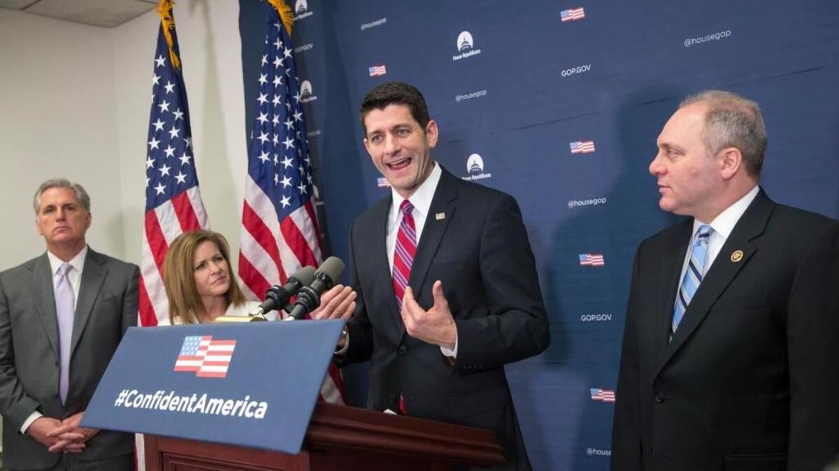 House Speaker Paul Ryan, second from right, says President Obama’s “words and actions (on gun control) amount to a form of intimidation that undermines liberty.”