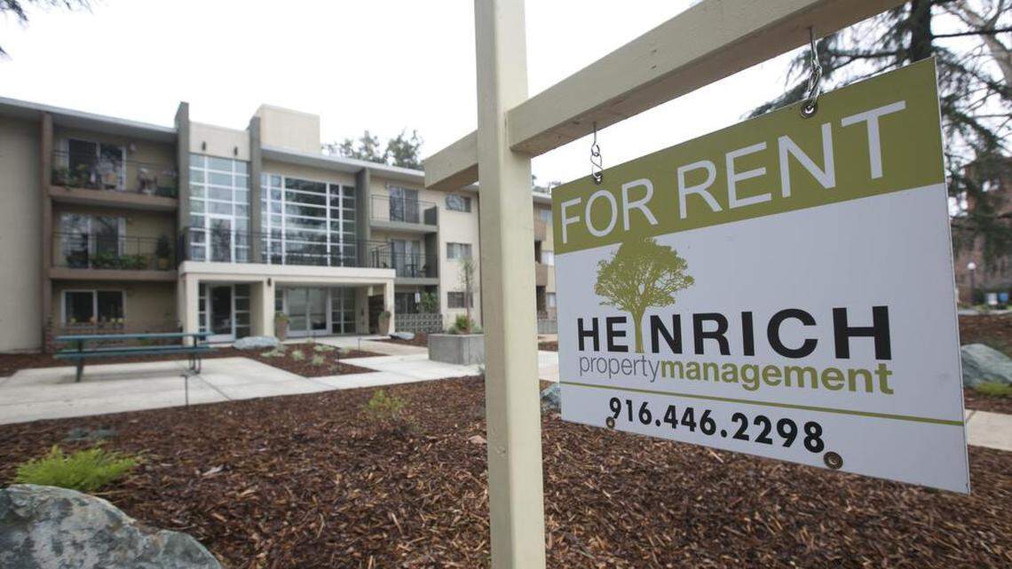 A “For Rent” sign outside an apartment building in Sacramento.
