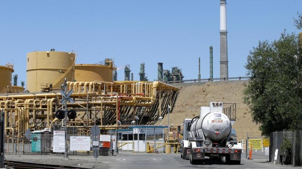 A truck drives into the Valero refinery in Benicia in July.