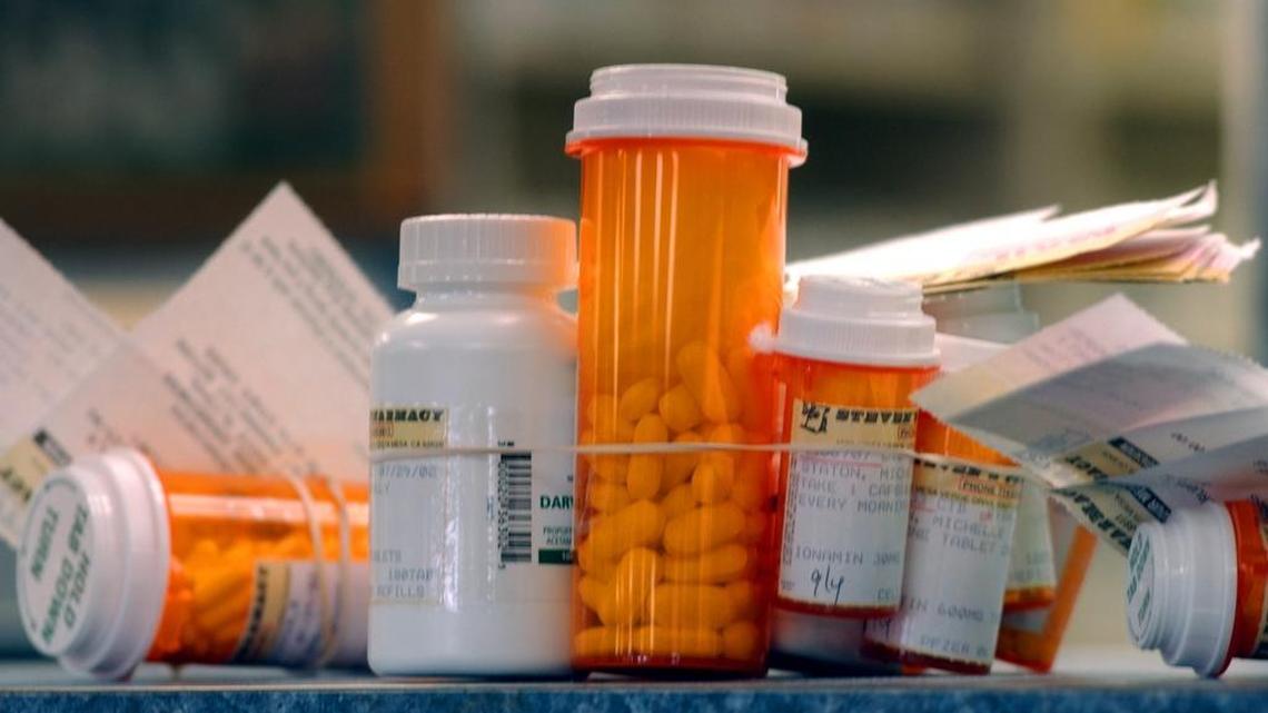 Pharmaceutical firms are spending heavily to defeat Proposition 61, which supporters say will lower drug prices in California.