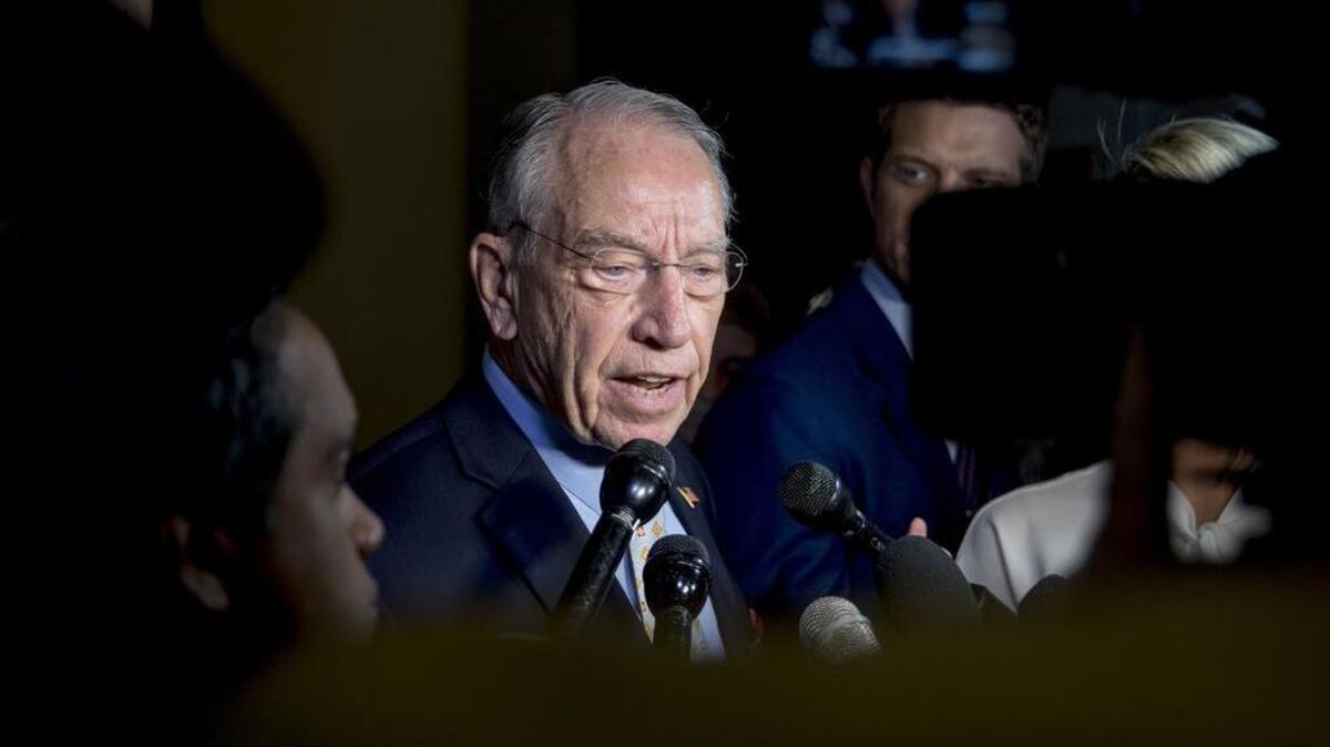 Senate Judiciary Committee Chairman Chuck Grassley, R-Iowa, speaks to reporters on Capitol Hill on Wednesday. Christine Blasey Ford wants the FBI to investigate her allegation that she was sexually assaulted by Supreme Court nominee Brett Kavanaugh before she testifies at a Judiciary Committee hearing next week.