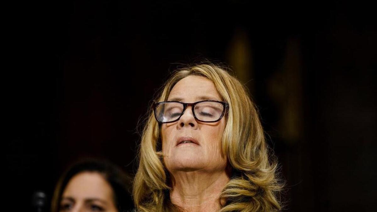 Christine Blasey Ford takes a breath while testifying Sept. 27 before the Senate Judiciary Committee.