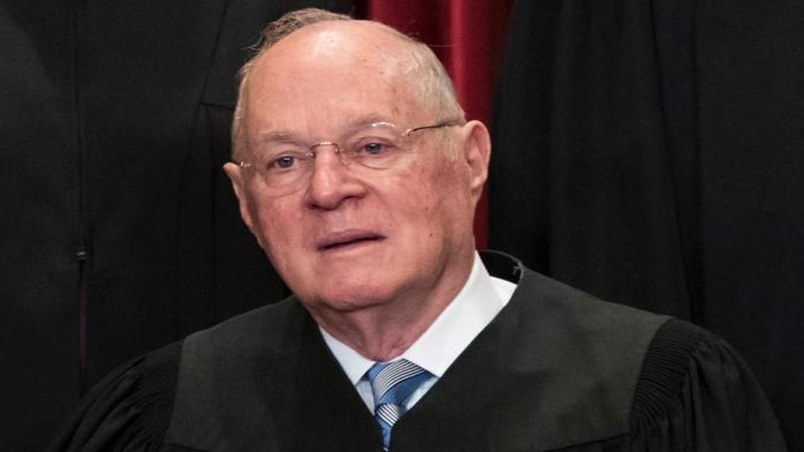 Associate Justice Anthony M. Kennedy joins other justices of the U.S. Supreme Court for an official group portrait in June at the Supreme Court Building in Washington. Kennedy was named to the high court in 1987 by President Ronald Reagan and took the oath of office in 1988.