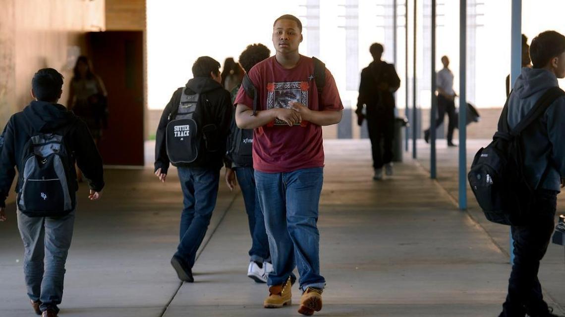 Tremaine Newton walks to class at Luther Burbank High School in the Sacramento City Unified School District. He’s among only 12 percent of African American students in the international baccalaureate program, in a district with inordinate suspension rates for black males. IB exams were canceled this year amid the worldwide coronavirus pandemic.