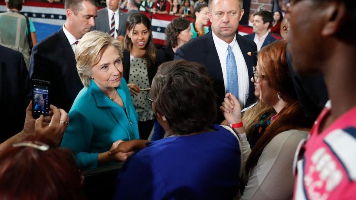 Democratic presidential candidate Hillary Clinton greets people in the audience after speaking at a campaign event at Truckee Meadows Community College, in Reno, Nev., on Aug. 25.