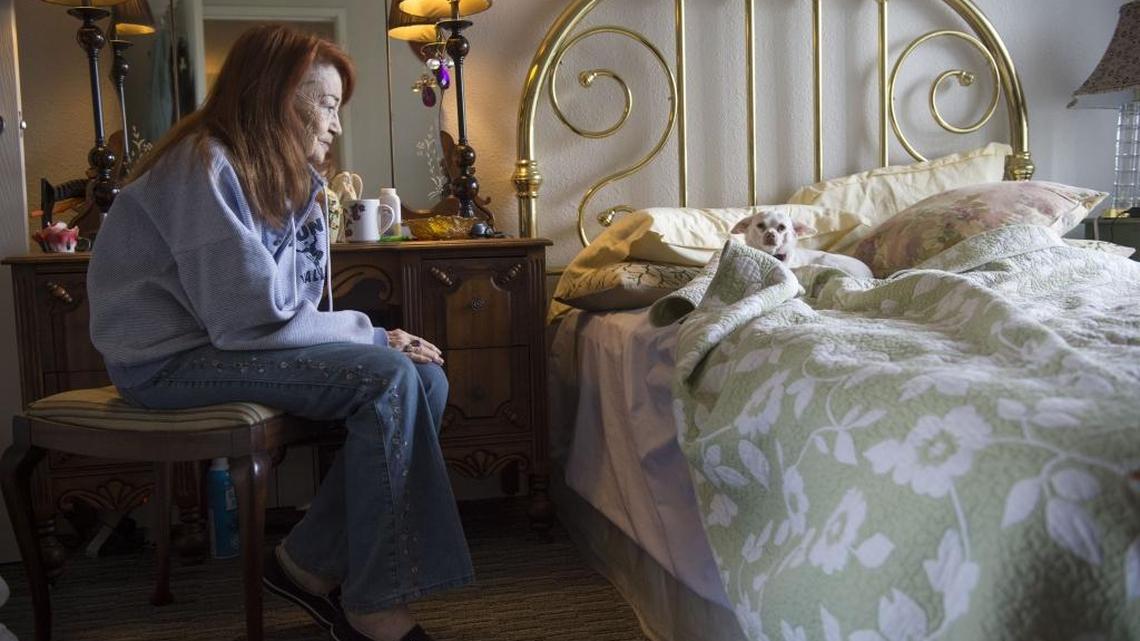 Faye Duncan sits in her bedroom at her midtown Sacramento apartment community serving low-income seniors. She said she was on a waiting list for 18 months.