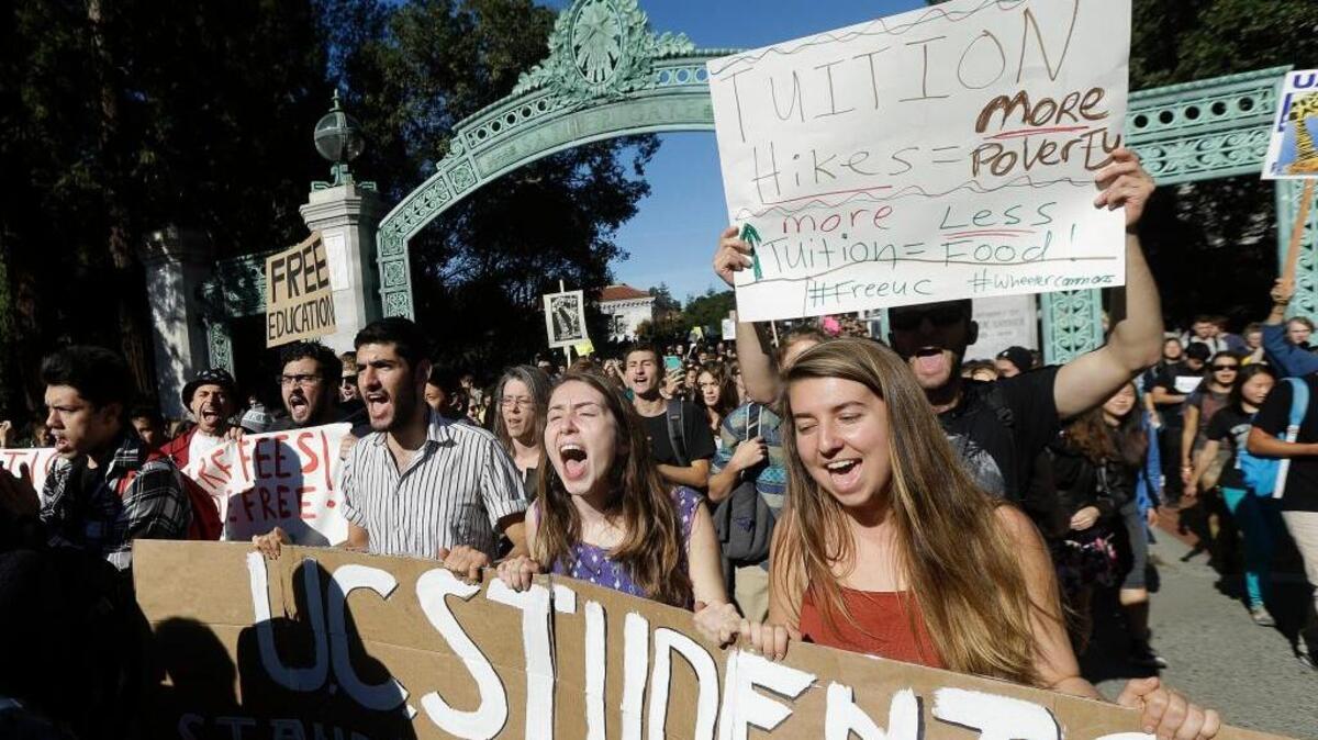 
Students march during a protest against tuition increases at the University of California, Berkeley. 
