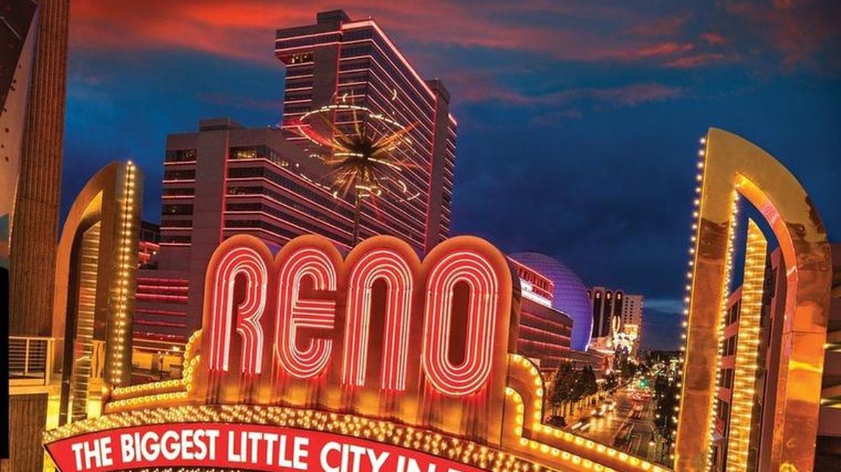 The Reno Arch has long welcomed visitors to the Nevada city. Real estate agents say the federal tax law has created incentives for Californians to move to the lower-tax state.