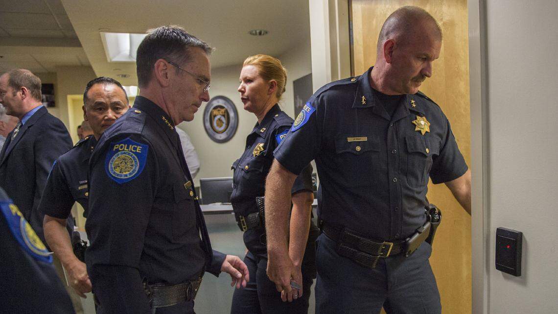 Sacramento Police Chief Sam Somers Jr., left, leaves a press conference after speaking and releasing audio and video in regards to the Joseph Mann investigation on Tues., Sept. 20, 2016, Sacramento, Calif.