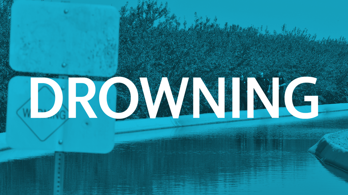 Drowning incident depicts emergency personnel at water canal