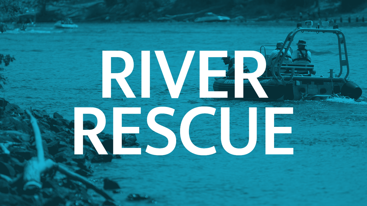 Drowning incident depicts emergency personnel in boats on water