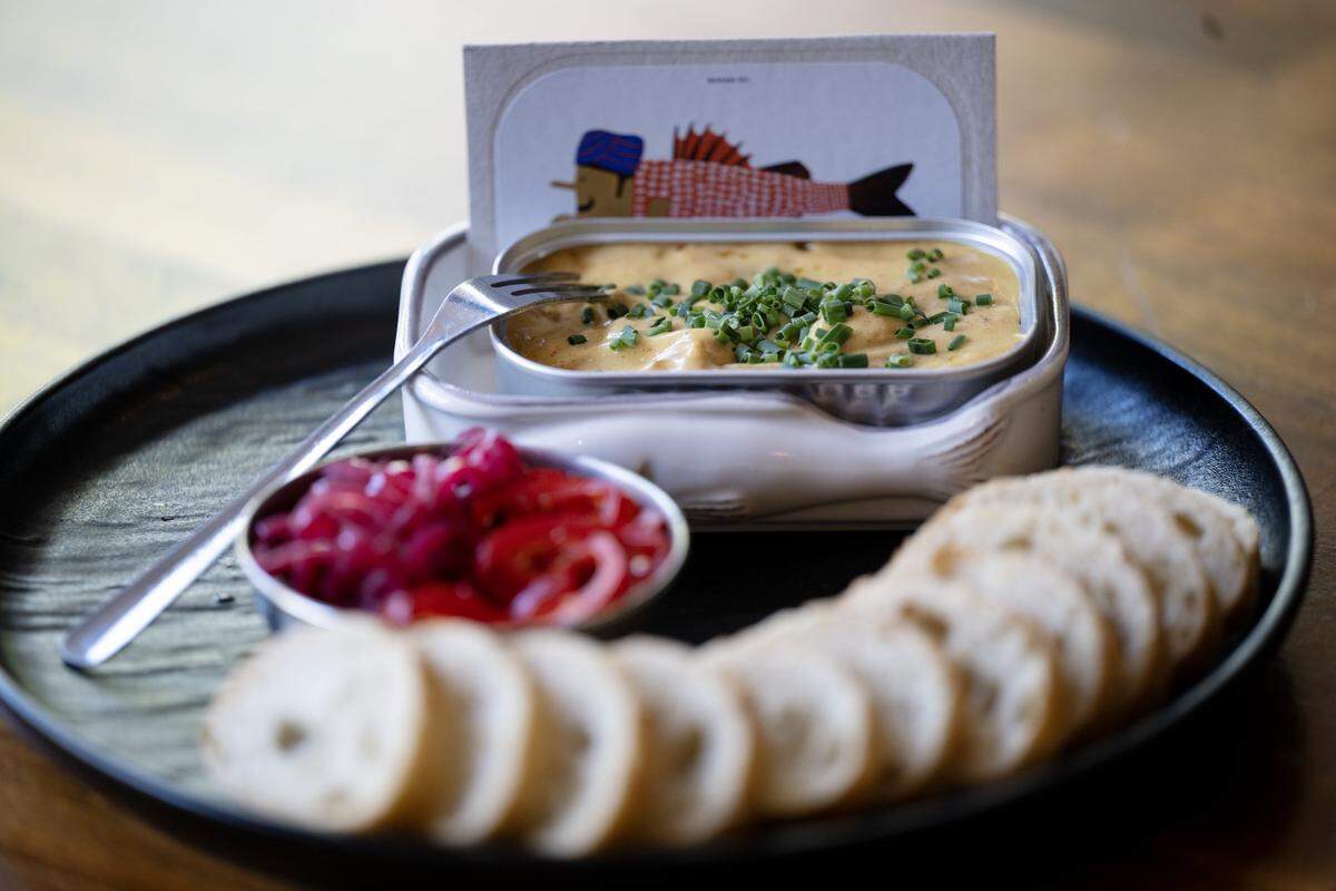 A selection of premium tinned fish is displayed at The Nook Bistro & Wine Bar, showcasing the Spanish and Portuguese conservas tradition of preserved seafood paired with wine, on Wednesday.
