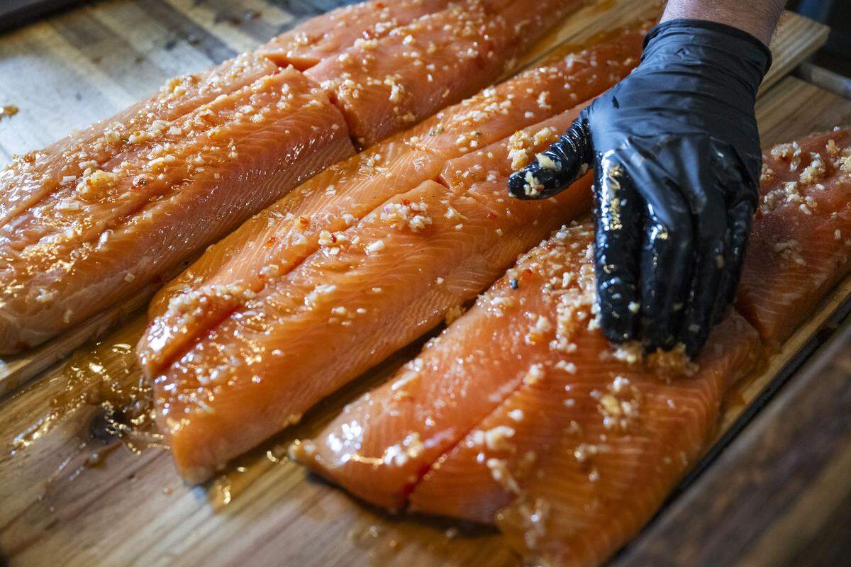 Mulvaney’s B&L executive chef John Trujillo prepares king salmon that will be cooked on cedar planks on Monday, May 18, 2026.