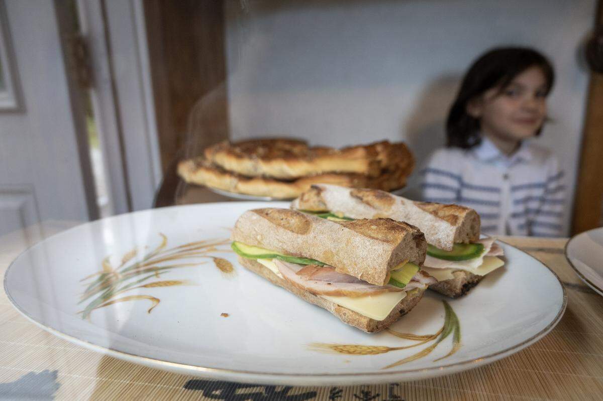 Ham sandwiches on sour dough bread are sold at Artisan Lavinia in Oregon House on May 2.