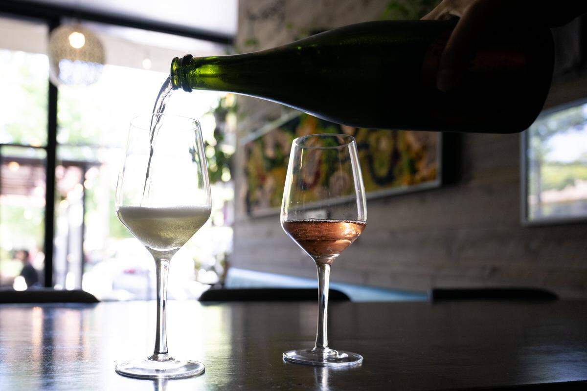 California Ultraviolet Sparkling Rosé and the Spanish white wine Bornos Verdejo Brut are poured at The Nook Bistro & Wine Bar on Wednesday.