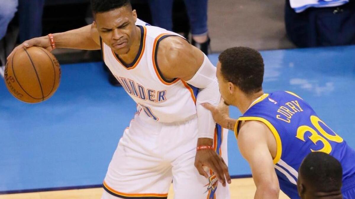 Oklahoma City Thunder guard Russell Westbrook (0) is defended by Golden State Warriors guard Stephen Curry (30) during Game 4 of the NBA basketball Western Conference finals in Oklahoma City, Tuesday, May 24, 2016. Westbrook had a triple double (36 points, 11 assists, 11 rebounds). Curry scored 19 points on 6-of-20 shooting, including 2 of 10 from three-point range.