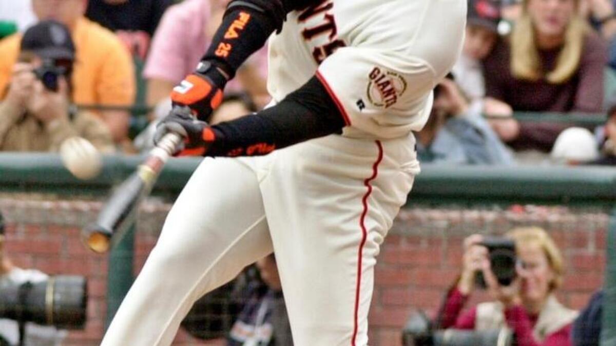 
Giants slugger Barry Bonds hits his 73rd home run of the season against the Los Angeles Dodgers at Pacific Bell Park in San Francisco on Sunday, Oct. 7, 2001. 


