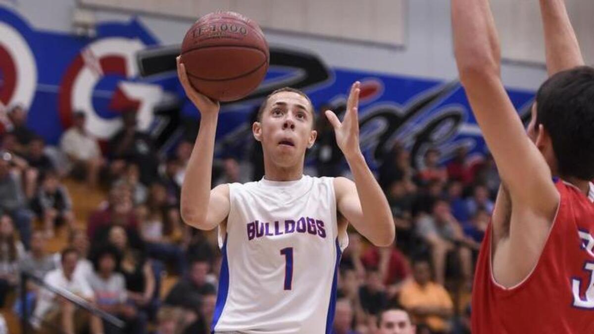 Folsom High School guard Jordan Ford goes to the basket in a CIF Northern California playoff game against St. Ignatius on Saturday, March 15, 2014, in Folsom, Calif.