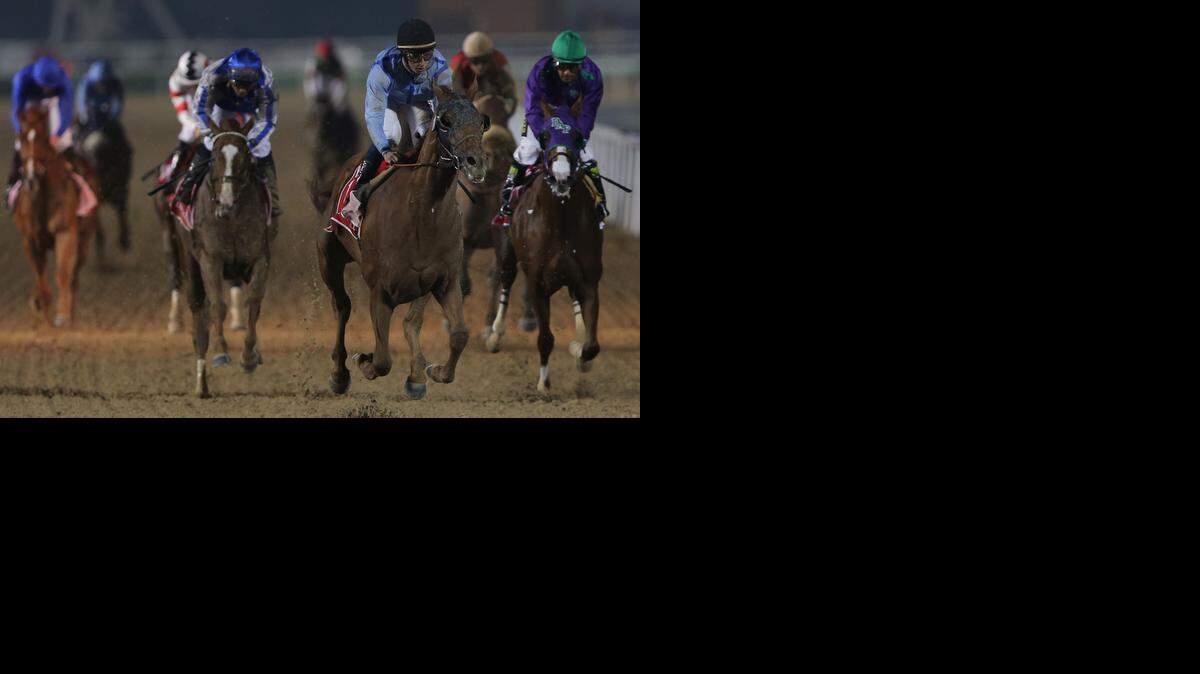 UAE-owned Prince Bishop ridden by William Buick, third right, crosses the finish line to win the $ 10,000,000 Dubai World Cup during the Dubai World Cup horse races at Meydan Racecourse in Dubai, United Arab Emirates, Saturday, March 28, 2015. 
