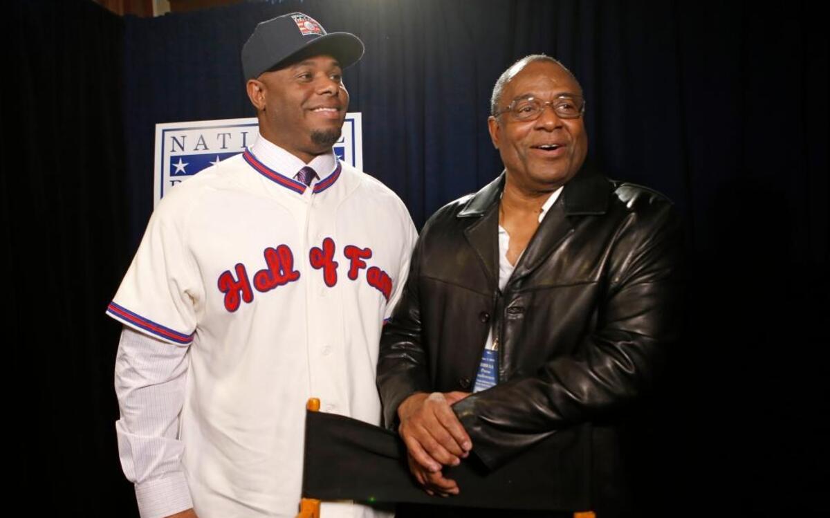 Retired major league outfielder Ken Griffey Jr. and his father, Ken Griffey Sr., pose at a press conference announcing Junior’s election to baseball’s Hall of Fame on Jan. 7, 2016, in New York.