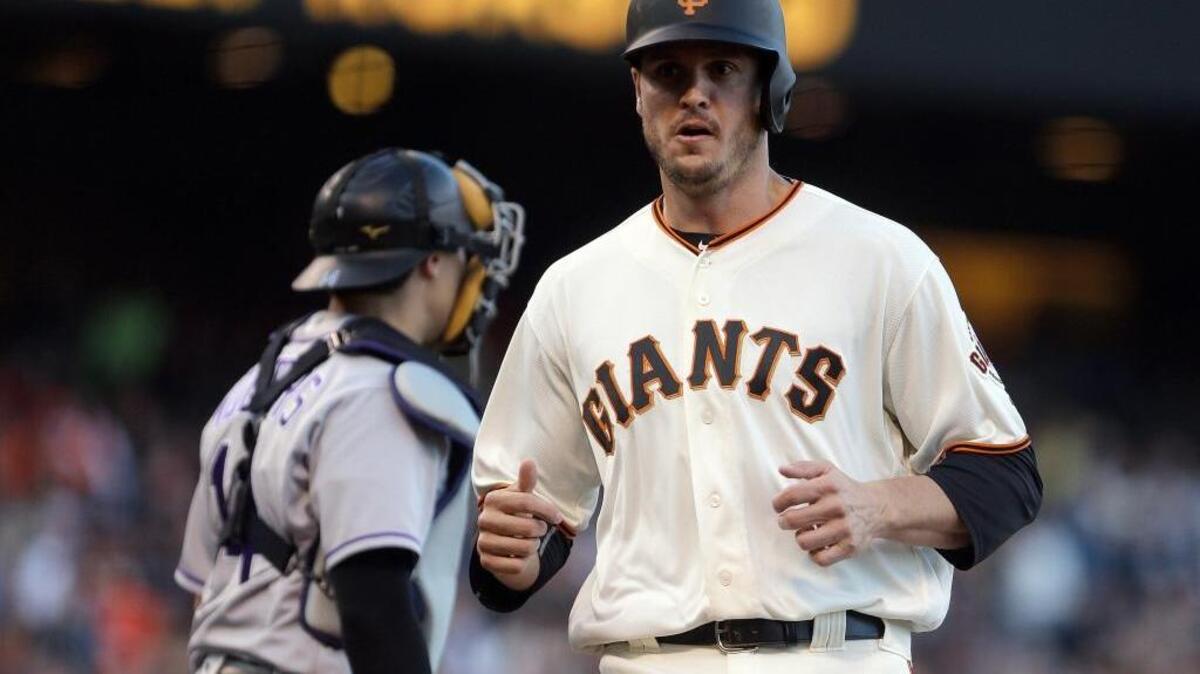 The San Francisco Giants’ Grant Green, right, scores a run against the Colorado Rockies in a baseball game Wednesday, July 6, 2016, in San Francisco. Green is one of several call-ups who have contributed to the Giants’ 57-33 record, the best in the majors.