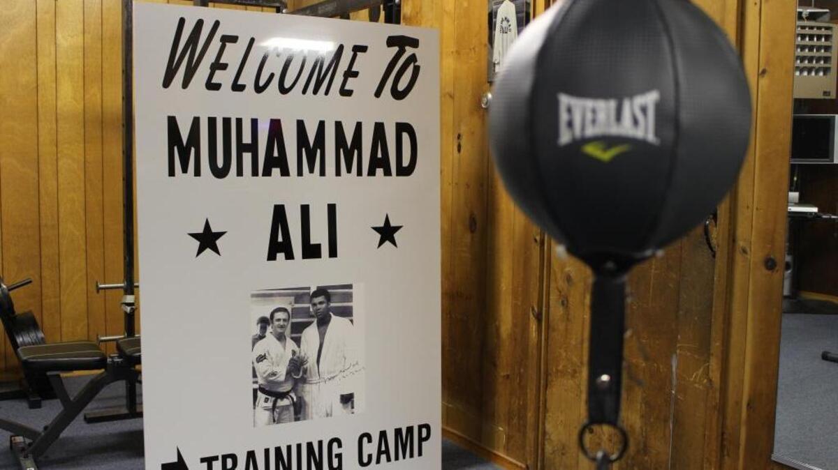 In this photo taken Monday, June 6, 2016, a sign is displayed inside the gym at Muhammad Ali’s training camp in Deer Lake, Pa. Since Ali’s death at 74, residents have been coming to the rustic hilltop camp to pay their respects.
